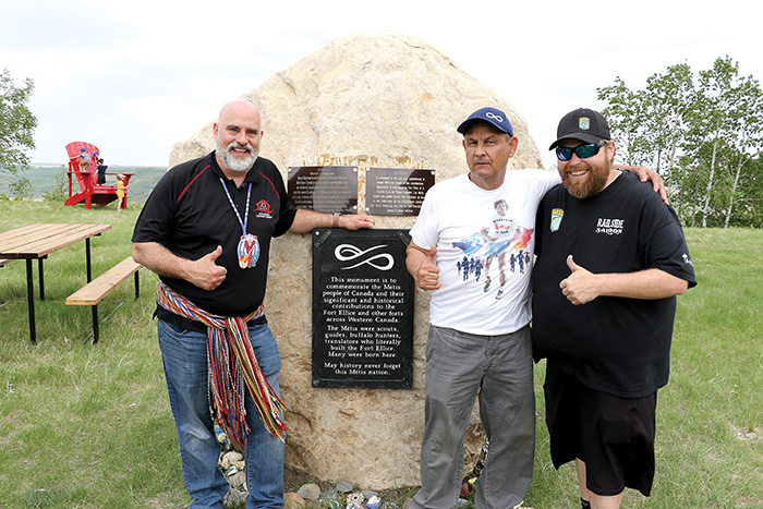  Will Goodon of Manitoba Métis Federation Southwest Region (MMFS), Terry Haney, president of Manitoba Métis Federation (MMF) Fort-Ellice local and Devon Gurniak resident of St. Lazare at the Fort Ellice monument.<br />
